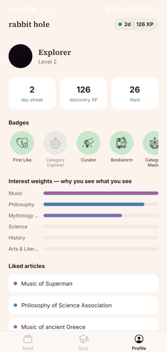 Rabbit Hole profile screen with streak, XP, badges, and interest weights